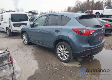 2015 Mazda Cx-5 Grand Touring z USA, uszkodzony, nr VIN JM3KE4DY8F0530671